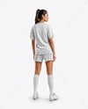 Female Soccer Player Wearing Jersey and Shorts Mockup
