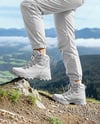 Pair of Hiking Boots on Woman's Legs Mockup