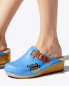 Pair of Clogs on Woman's Legs Sitting on Stool Mockup