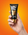 Matte Cosmetic Tube in a Hand Mockup