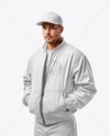 Baseball Player Wearing a Bomber Jacket and Cap Mockup