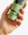 Cosmetic Tube in a Hand Mockup