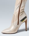 Pair of Over-The-Knee Boots on Women's Legs with Dress Mockup