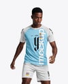 Soccer Player Wearing Raglan Jersey and Shorts Mockup