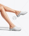 Pair of Clogs on Woman's Legs Mockup