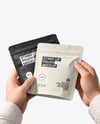 Two Matte Stand-Up Pouch in Hands Mockup