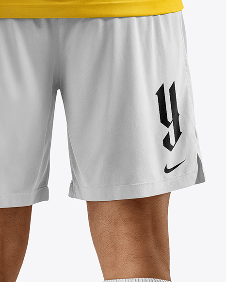 Soccer Player Wearing Jersey and Shorts Mockup