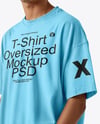 Young Man Wearing Oversized T-Shirt and Cap Mockup
