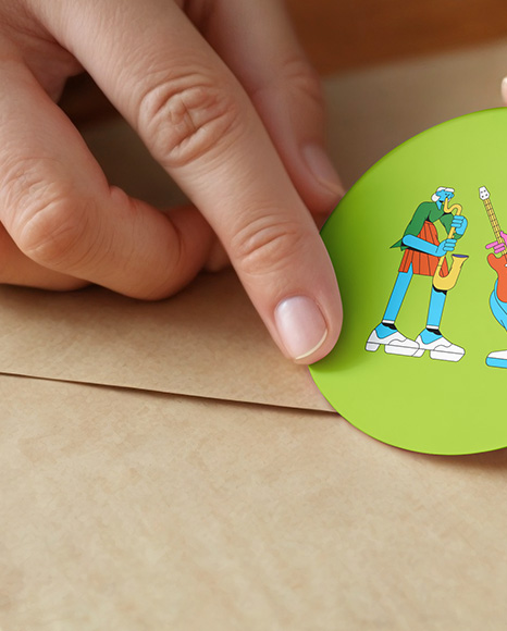 Round Sticker in a Hands Mockup