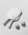 Two Pickleball Paddles with Balls on a Court Mockup