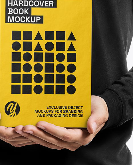 Man Holding Book Mockup