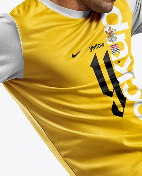 Man Wearing Soccer Jersey and Shorts Mockup