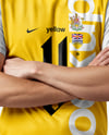 Soccer Player Wearing Jersey and Shorts Mockup