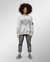 Black Woman Wearing an Oversize Sweatshirt and Jeans Mockup