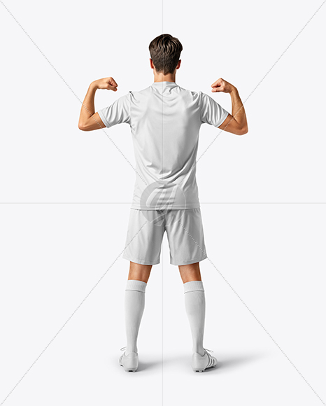 Man Wearing Soccer Jersey and Shorts Mockup