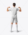 Man Wearing Soccer Jersey and Shorts Mockup