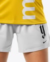 Woman Wearing Soccer Jersey and Shorts Mockup