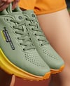 Pair of Running Shoes in Woman's Hand Mockup