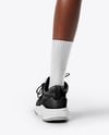 Female Basketball Player Wearing Jersey and Shorts Mockup