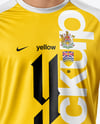 Man Wearing Soccer Jersey and Shorts Mockup