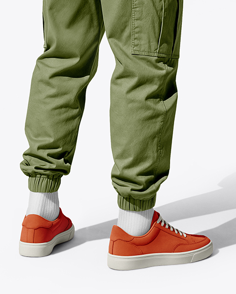 Young Man Wearing T-Shirt and Cargo Pants Holding Skateboard Mockup