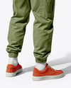Young Man Wearing T-Shirt and Cargo Pants Holding Skateboard Mockup
