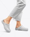 Pair of Clogs on Woman's Legs with Pants Mockup