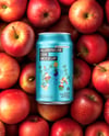 12oz Drink Can on a Stack of Red Apples Mockup