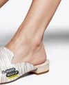 Pair of Leather Mules on Woman's Legs Mockup