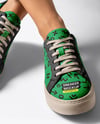Pair of Sneakers on Woman's Legs Mockup