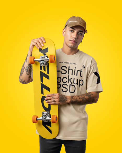 Young Man Wearing T-Shirt and Holding Skateboard Mockup