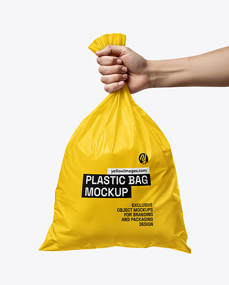 Plastic Bag in a Hand Mockup - Packaging mockups