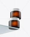 Two Amber Cosmetic Jars on the Glass Mockup