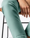 Pair of Sneakers on Woman's Legs Mockup