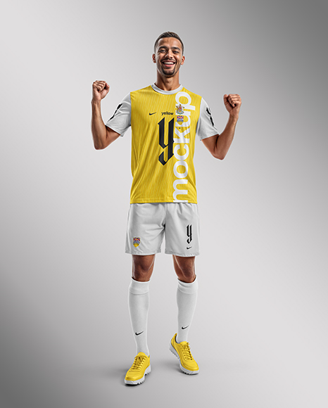 Smiling Man Wearing a Full Soccer Kit Mockup