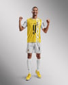 Smiling Man Wearing a Full Soccer Kit Mockup