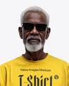 Elderly Afro-American Man Wearing Oversized T-Shirt & Sweatpants Mockup