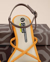 Pair of Strappy Sandals With Shoe Box Mockup