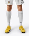 Man Wearing Long Sleeve Raglan Soccer Jersey and Shorts Mockup