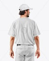 Baseball Player Wearing a Jersey and Cap Mockup