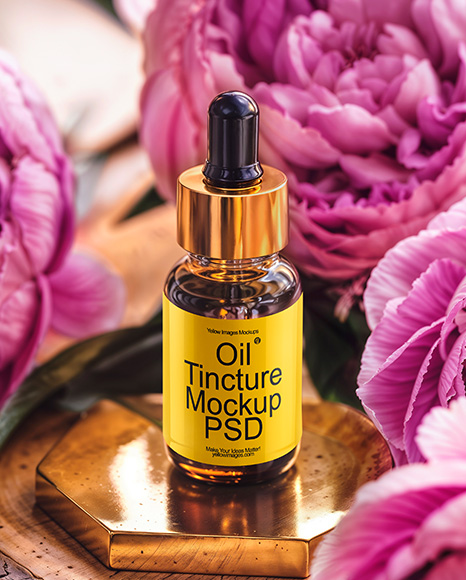 Amber Dropper Bottle with Oil Tincture Surrounded by Flowers Mockup