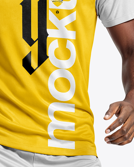 Soccer Player Wearing Raglan Jersey and Shorts Mockup