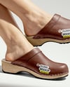 Pair of Clogs on Woman's Legs Mockup