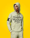 Black Man Wearing a Hoodie and Pants Mockup