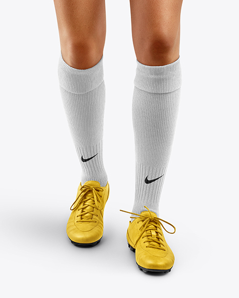 Female Soccer Player Wearing Jersey and Shorts Mockup