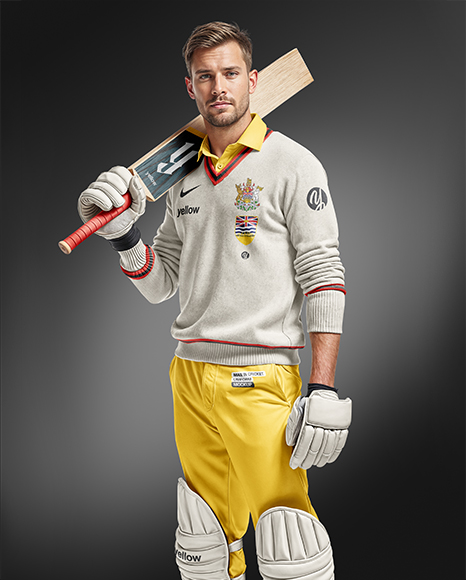 Cricket Player Wearing a Jumper Holding a Bat Mockup