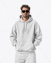 Young Man Wearing Oversize Hoodie and Pants Mockup