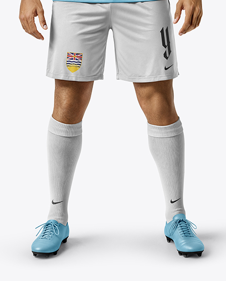 Soccer Player Wearing Jersey and Shorts Mockup