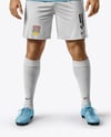 Soccer Player Wearing Jersey and Shorts Mockup