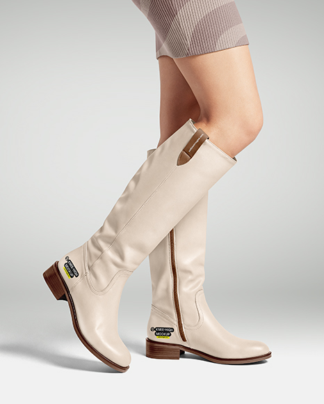 Pair of High-Knee Boots on Women's Legs with Dress Mockup